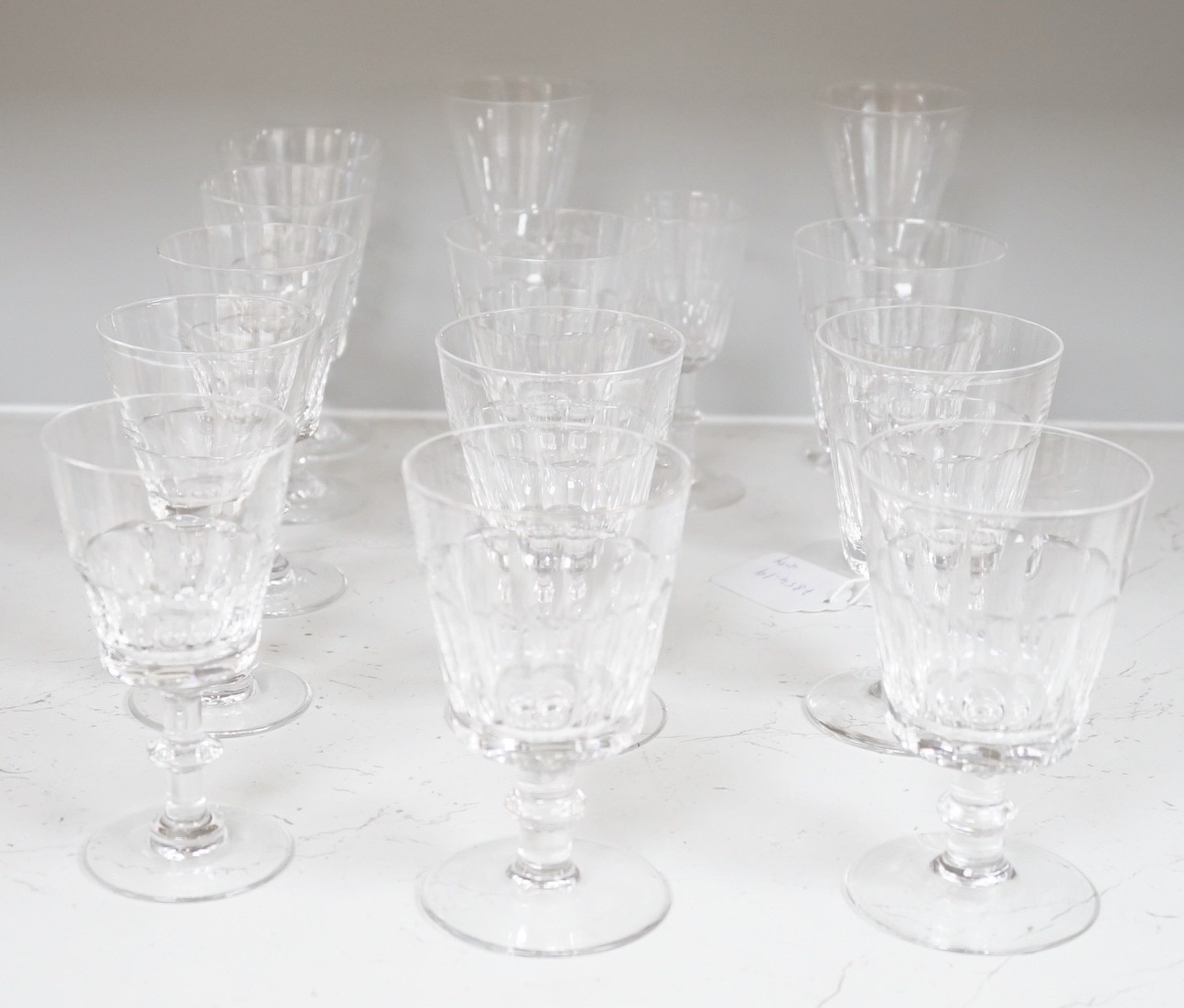 A set of nine cut drinking glasses, five similar glasses and three others